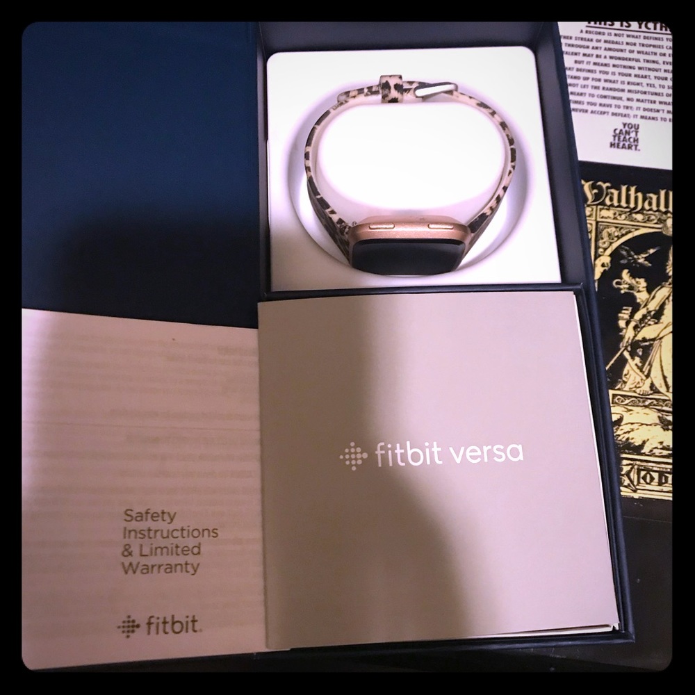 Rose gold Fitbit versa